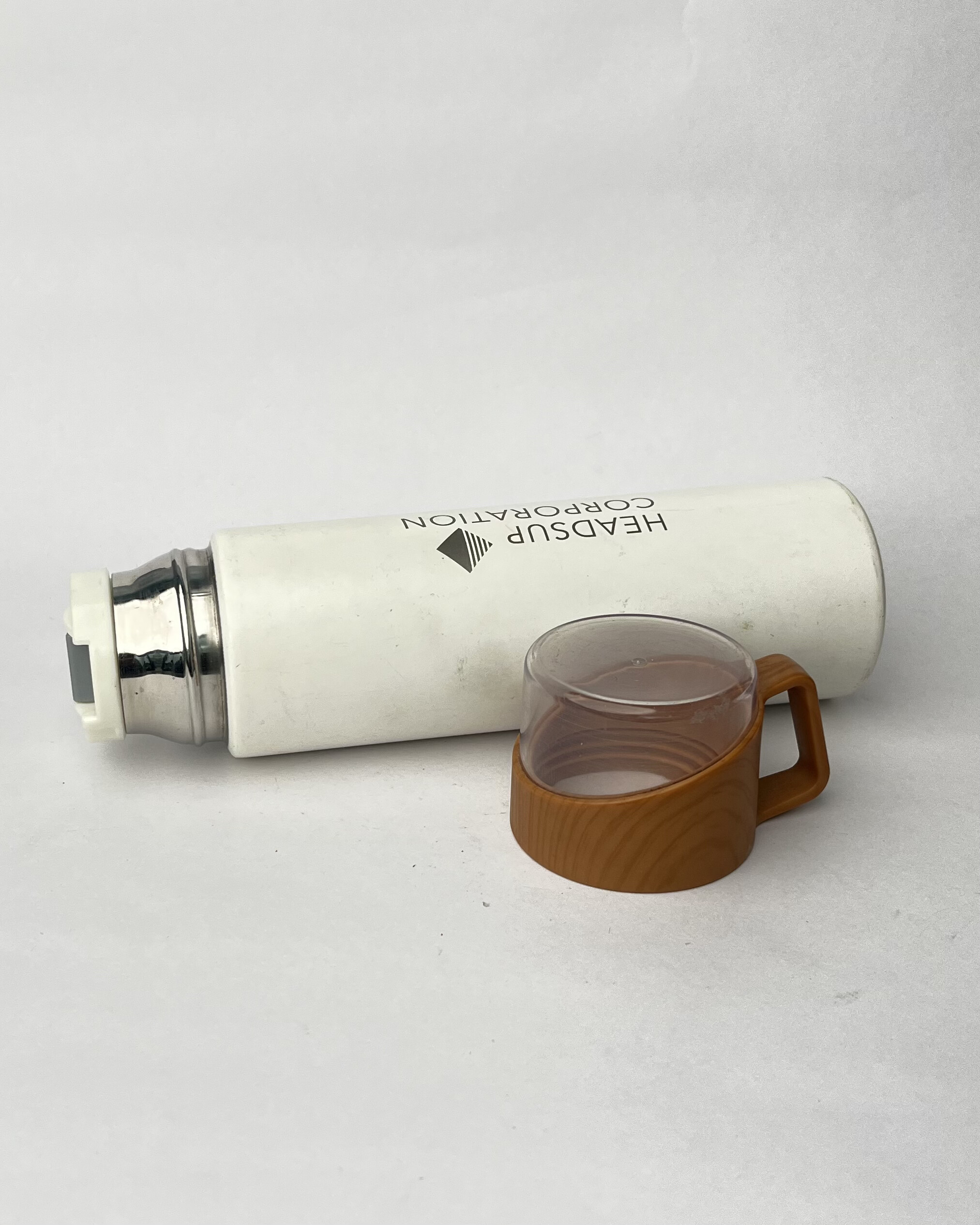 IvoryHaven – Cream bottle with a translucent cup and wood base